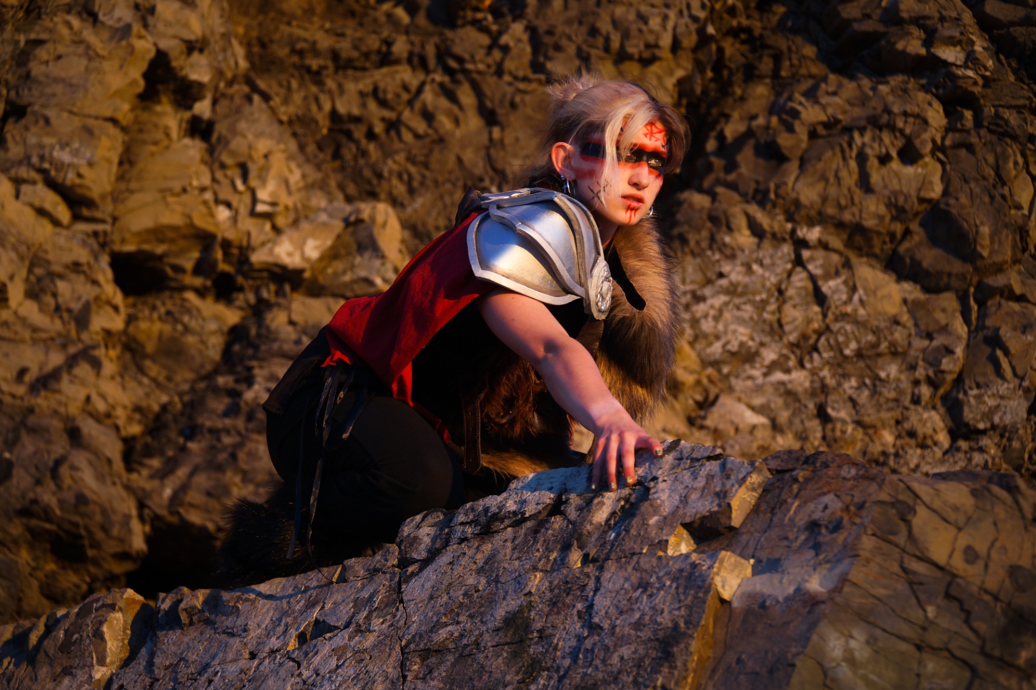 Armored character on rocks